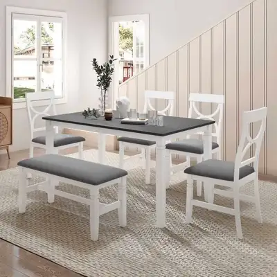 This is a dining set with a table, four chairs, and a bench, perfect for family meals or gatherings....
