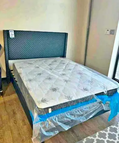 This is a brand new queen bed frame with mattress, perfect for upgrading your bedroom! The set featu...