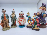 Clown lot of piggy bank and figurines, some creepy