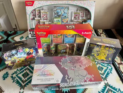 Dive into the world of Pokemon with this collection of sealed products! This lot includes a variety...