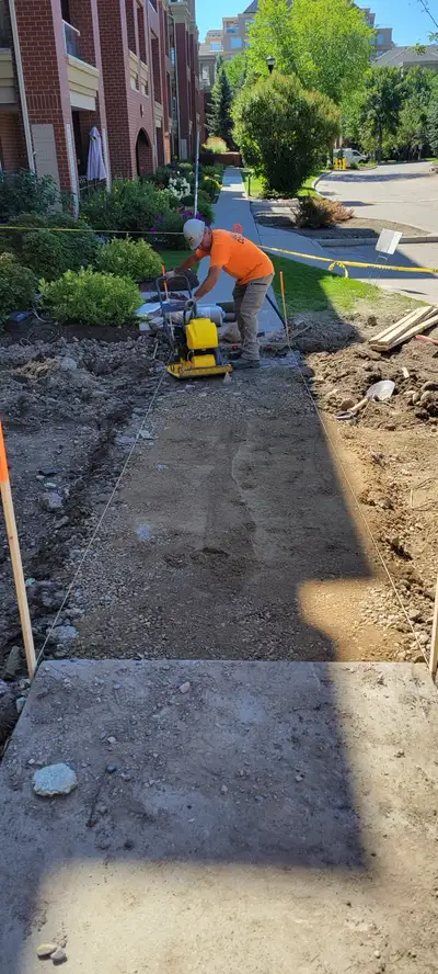 I'm a concrete contractor in Calgary specializing in durable and high-quality concrete work for path...