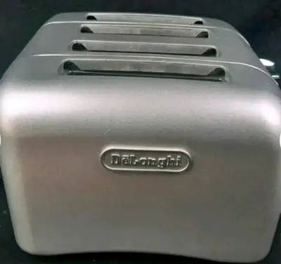 Brushed Stainless steel 4 slot toaster Bagel setting Cancel button Defrost setting Dials for levels...