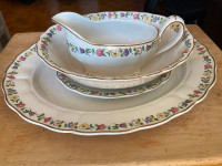 Vintage set platter, gravy boat with plate, serving bowl.