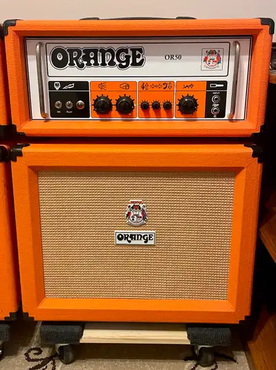 50 watt single channel amp head. Includes matching Orange PPC112 cab with original Celestion Vintage...