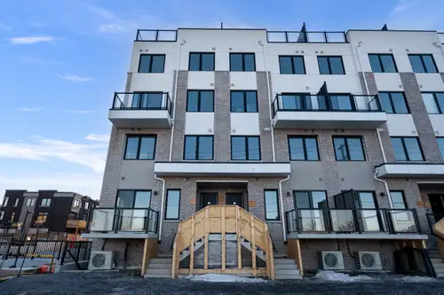 Welcome to your new home! This newly built, ground-level condo townhouse is perfectly situated in a...