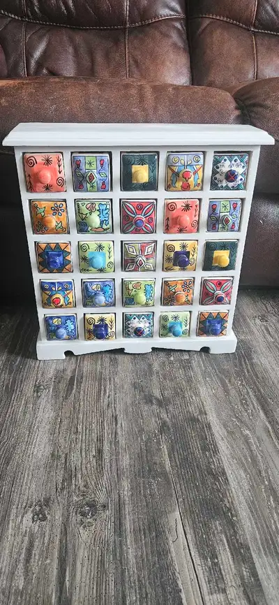 Amazing and rare piece for sale! 25 drawer apothecary/spice/jewellery cabinet Each drawer is hand pa...