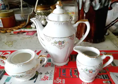 Vintage porcelain tea pot, creamer and sugar set Japan, View more