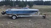 Boat trailer for sale, bonus boat/outboard