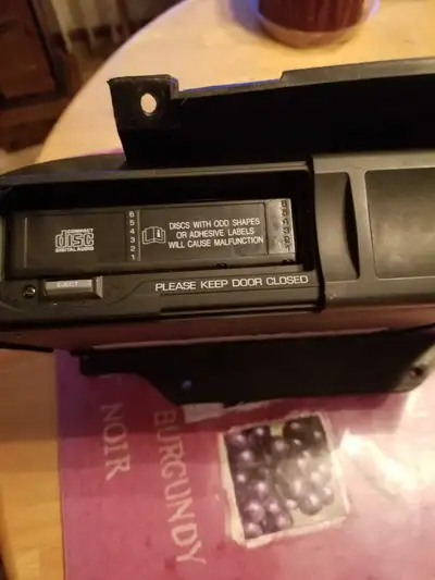 Console mounted 6 pack player out of a 2002 F150. I don't know for sure if it works as the factory h...