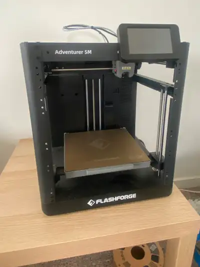 Less than 100 hours of use flash forge adventure 5m. 3d printer. Everything works fine. Asking $250