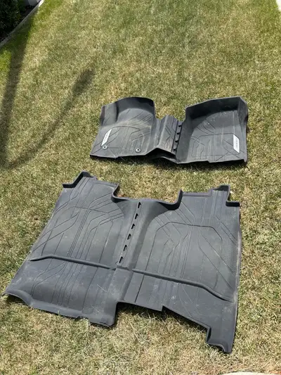 OEM heavy duty floor mats for a Chevy Silverado 1/2 ton truck with front bench seat. Will fit in a G...