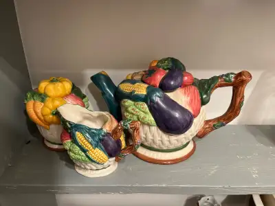 Add a touch of whimsy to your kitchen with this delightful, vintage vegetable-themed teapot set, com...