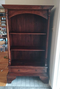 Antique bookcase with storage drawer