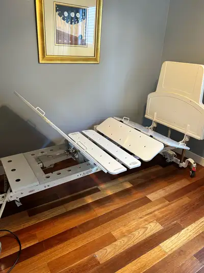 ALL REASONABLE OFFERS WILL BE CONSIDERED 6 Way Adjustable Hospital Bed (FloorLine LTC) is the perfec...