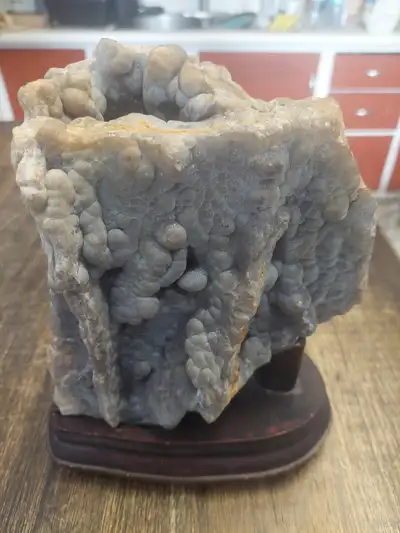 Large purple fluorite formation on wood base large piece 9 inches tall 2100 grams Nice piece of a ge...