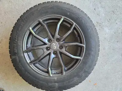 4 lightly Toronto-used Bridgestone Blizzak DM V2 winter tires 235/65R18, 106S. mounted on Infiniti a...