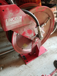 Lincoln Heavy Duty Auto shop Oil reel, hose oil meter pump