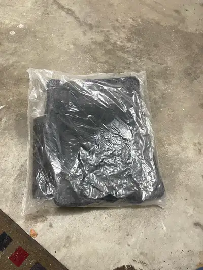 2020 F150 carpeted floor mats. Brand new still plastic. Grey in color. Probably fits other years