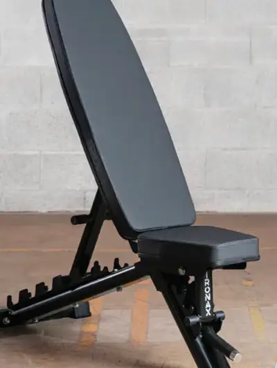 Weights and Ironax bench accessories., View more