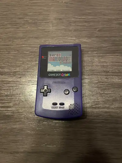 Selling my Gameboy Colour in Grape colour. Everything works as it should, it has minor scratches fro...
