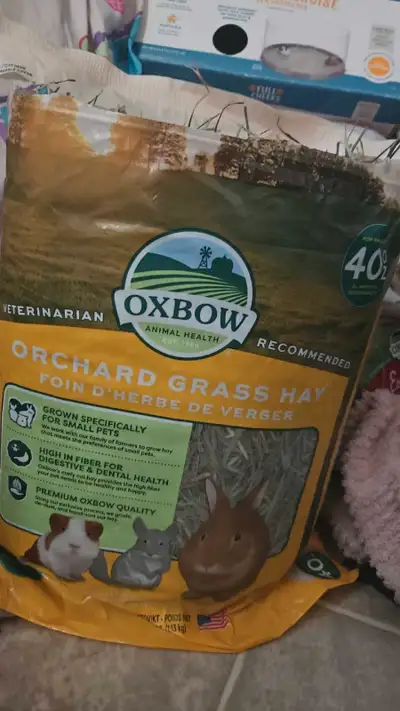 Barely used hay and young rabbit food for pickup