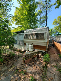 Vintage glenelle camper trailer with sunroom