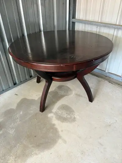 Solid table in very good condition not sure what type of wood bur very hard.