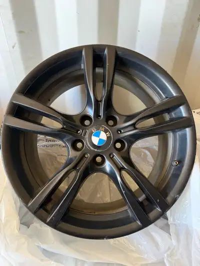 Selling a set of 18” BMW OEM 400m rims perfect for various BMW models. This rim has a sleek design a...