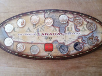 Canada 1999 millennium quarter set on oval card