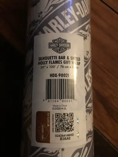 I have for sale three 100’ rolls of HARLEY DAVIDSON SILHOUETTE BAR AND SHIELD HOLLY FLAMES gift wrap...