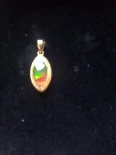 I have a brilliant Marquise Ammolite pendant from Ammolite mined in southern Alberta, with it being...