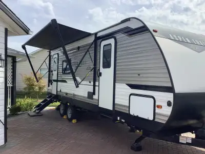 One owner, purchased new in 2021 and had the roof membrane replaced in 2024. This rv has a rear kitc...