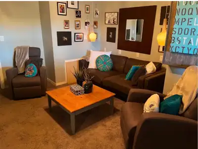 This furnished cozy basement room includes a bedroom, livingroom, bathroom. There is a small fridge...