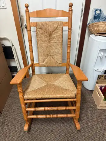 Beautifully crafted oak rocking chair in excellent condition. Solid wood frame, hand-woven rush seat...
