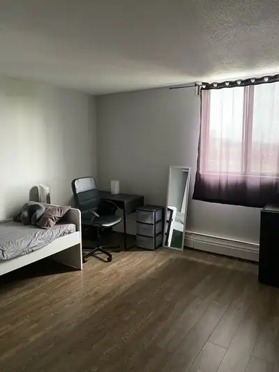 Bedroom available for rent starting July 1st in a 2-bedroom apartment with 1.5 bathrooms and an indo...