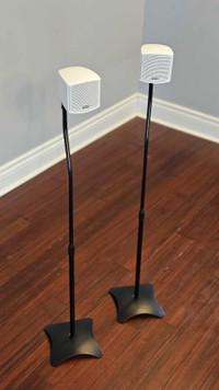 Pair of surround speakers with stands