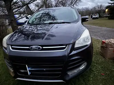 2014 Ford Escape Titanium Truck is immaculate inside. All leather, no rips or tears. Outside back ha...