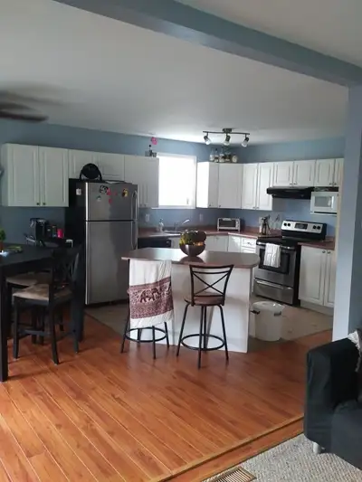 Large two bedroom apartment with open concept living /kitchen. Enjoy the warm weather sitting on the...