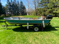 14’ aluminum boat with 15hp merc and trailer 