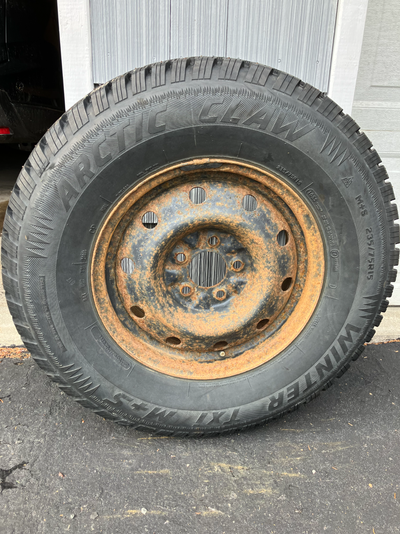 Two studded winter tires on steel rims for light truck. 235/75R15. Off 2008 Ford Ranger Tread depth:...