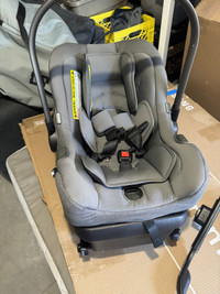 Nuna baby car seat with base and travel bag
