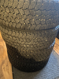 Four Goodyear Wrangler Kevlar 245/70R17 tires