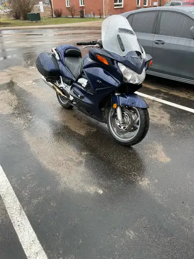 2004 Honda ST 1300 165.527 klms has extra Corbin seat and storage compartment and cover.Certified la...