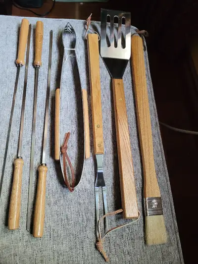 NEW NEVER USED set of stainless steel barbeque tools/accessories. 8 piece set. Has a turner (19 inch...