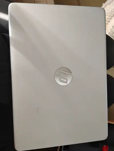 Silver HP laptop, View more