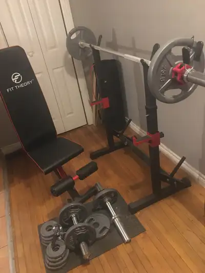 120 lbs of weights , an adjustable exercise bench with 2 resistance bands , 6 ft / 15.8 lbs Olympic...