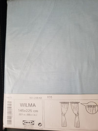 Wilma semi-sheer blue curtains.