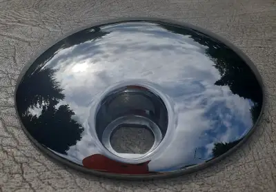 see pics, like new, no scratches and only selling as bought one with logo on it. If yours is scratch...