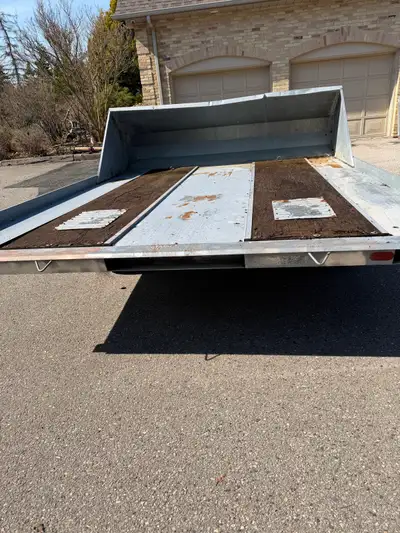 I am selling a Hyland Trailer perfect for hauling your snowmobile or ATV; Original owner, have owner...