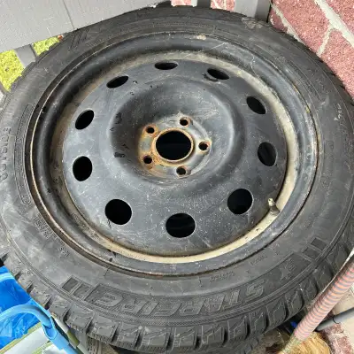 Winter snow tires and rims in size 215/55r17. These tires are used but still offer reliable traction...